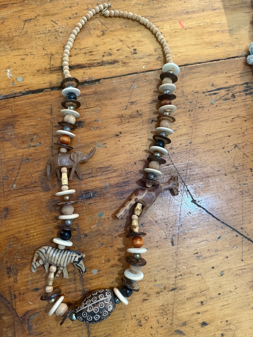Handcrafted Animal Bead Necklace in Brown and Cream